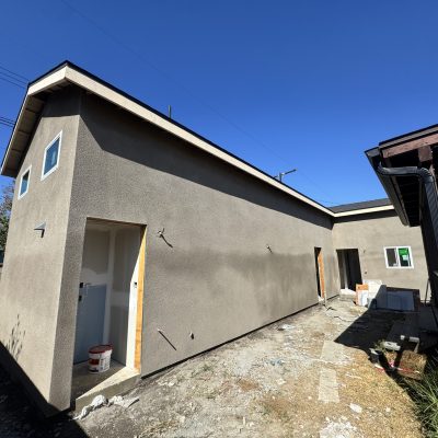 Finished accessory dwelling unit with attached garage and driveway