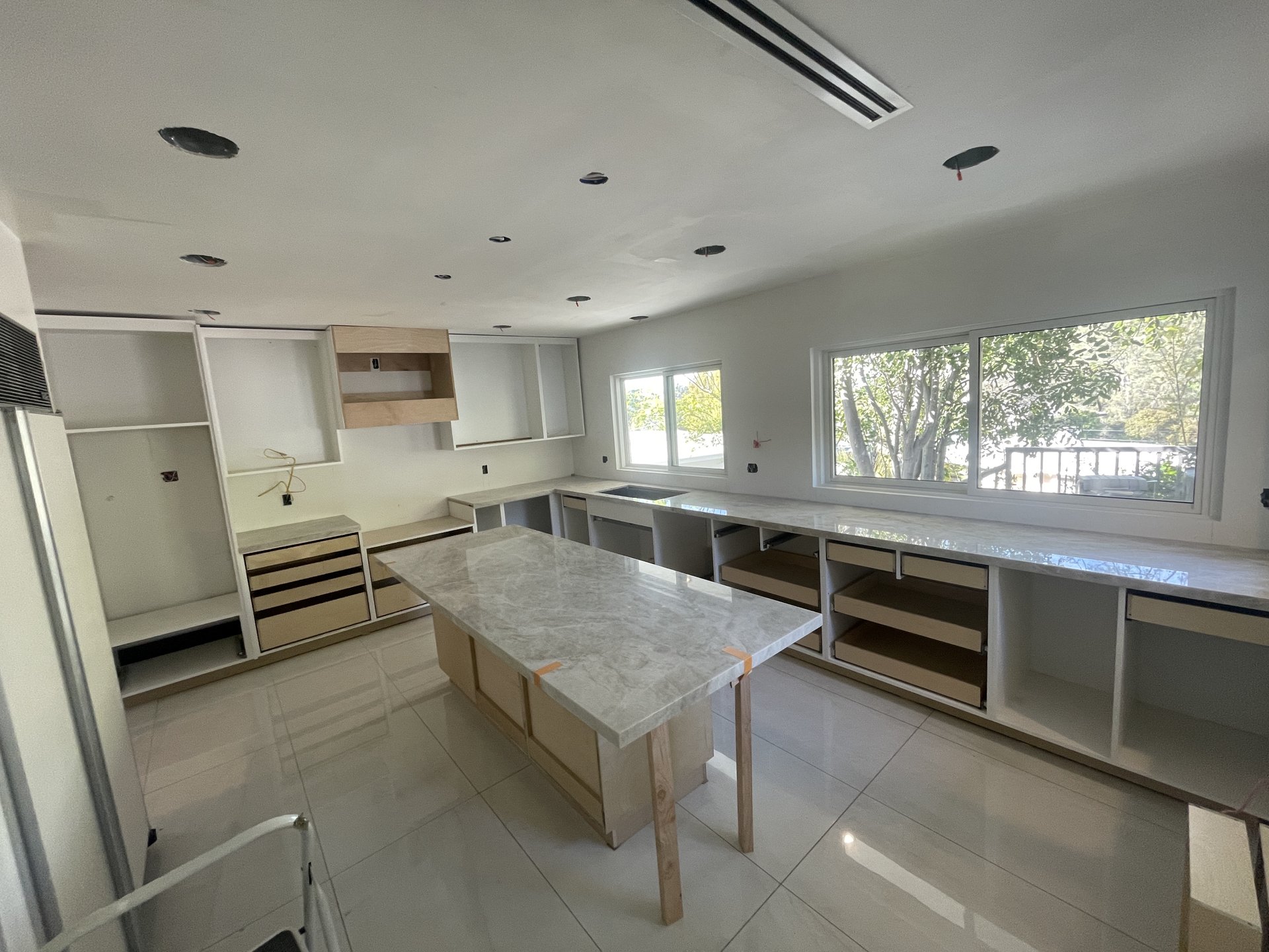 Custom kitchen remodel with island by 1st Choice Construction in Glendale, California
