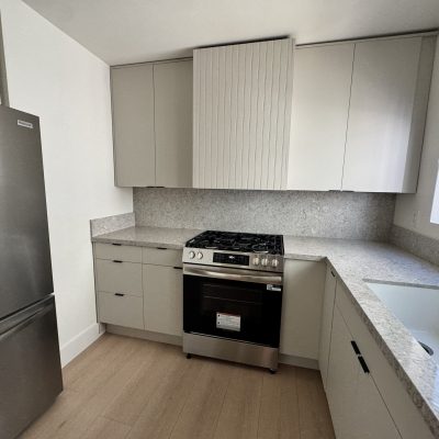 Modern kitchen remodel with stainless appliances by 1st Choice Construction